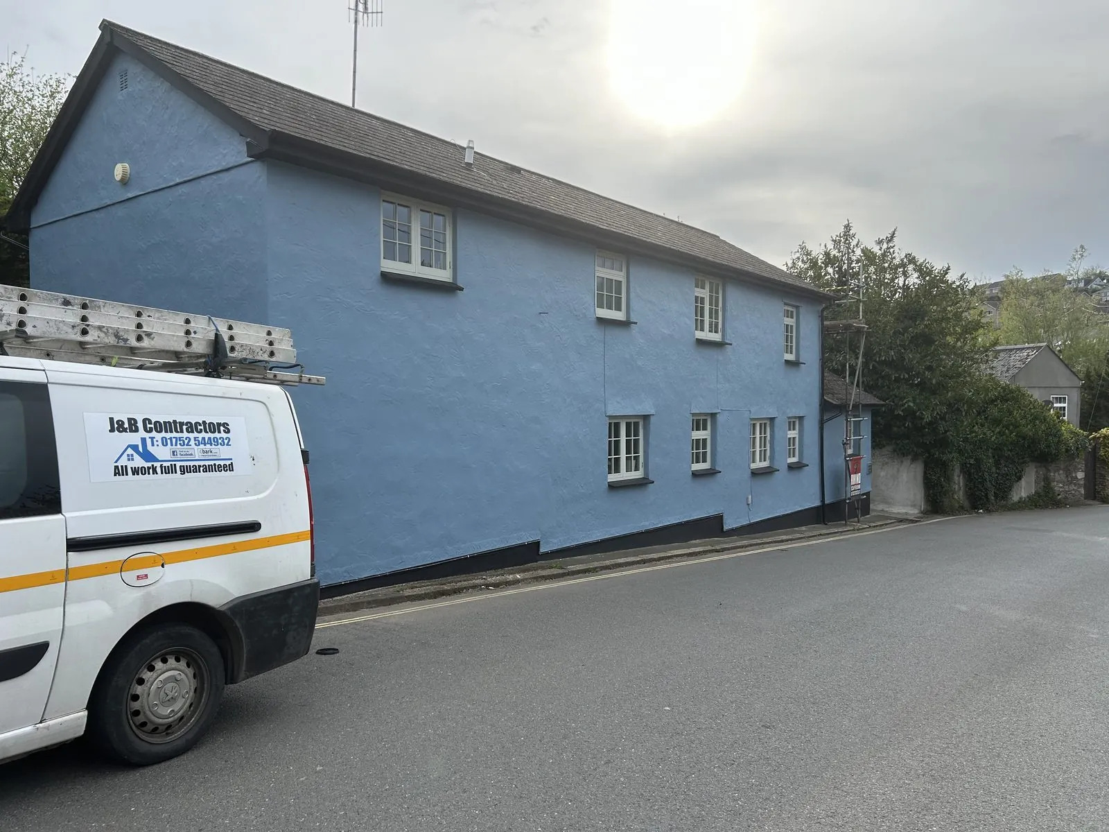 Exterior painting of a detached house in Penryn