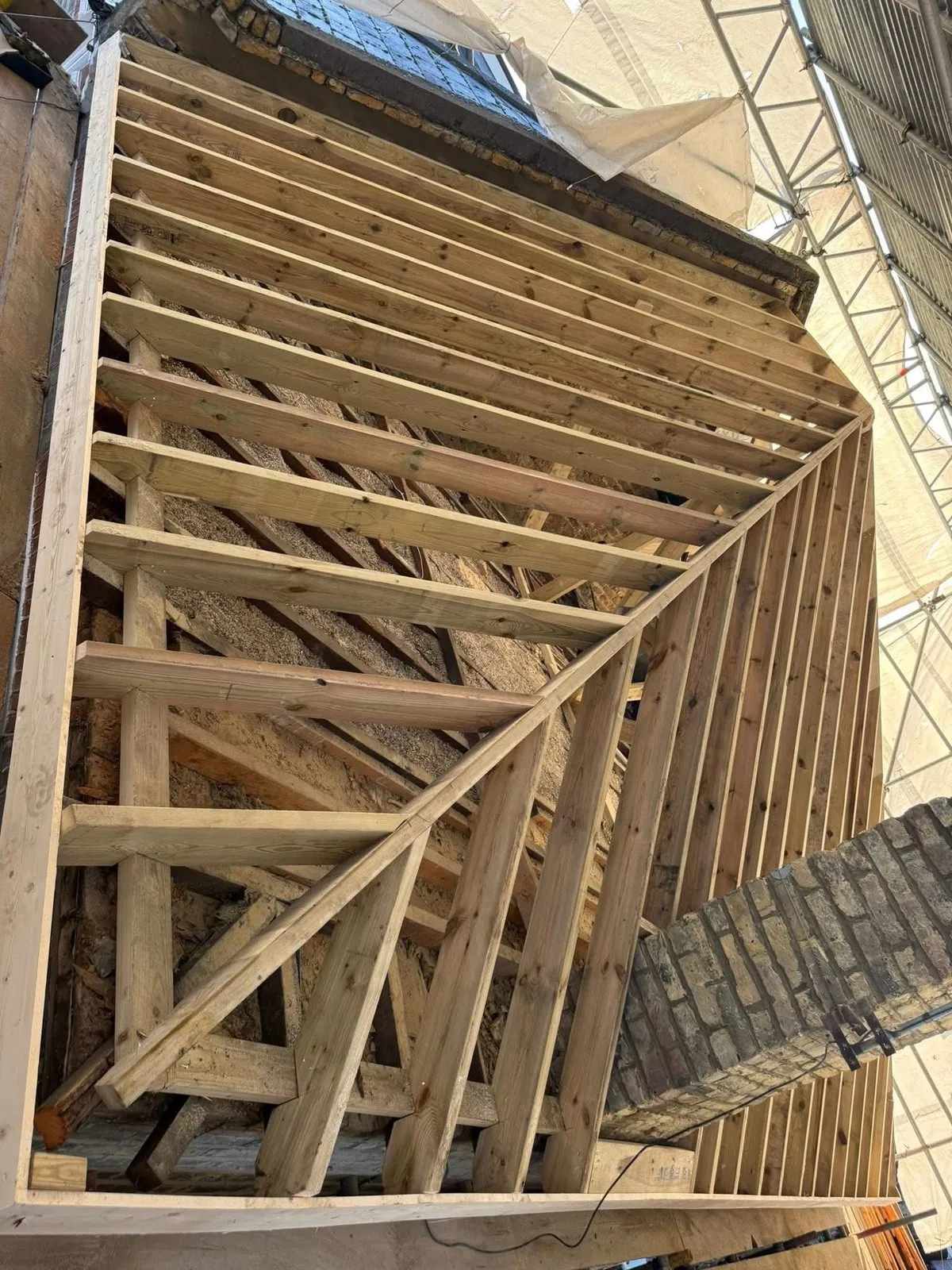 New roof timbers and rafters during a re-roof in Penryn